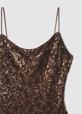 Vestito corto con paillettes e schiena scoperta