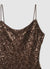 Vestito corto con paillettes e schiena scoperta