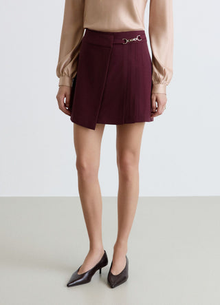 Gonna-pantalone corta con pieghe e fibbia
