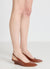 Slingback con tacco a zeppa bassa effetto cocco