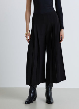 Pantaloni culotte con pieghe simmetriche