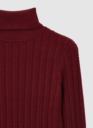 Maglia dolcevita con trecce