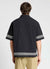 Camicia boxy con righe a contrasto