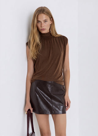Turtleneck top with draped open back