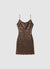 Vestito corto con paillettes e schiena scoperta