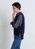 Solid colour knitted vest with side buttons
