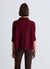 Top with crater neckline and three-quarter sleeves