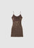 Vestito corto con paillettes e schiena scoperta