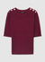 T-shirt in maglia a trecce con bottoni sulle spalle