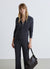 Cardigan con zip e cappuccio a trecce