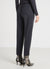 Trousers with pleats and elasticated waistband