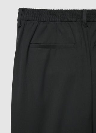 Long trousers with elastic waistband