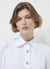 Gold button-down shirt