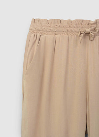 Plain-coloured long trousers