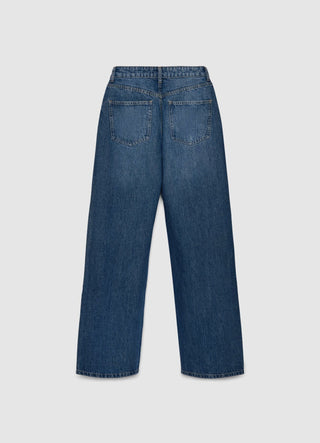 Jeans wide leg con patta asimmetrica