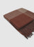 Scarf with fringes and checked pattern