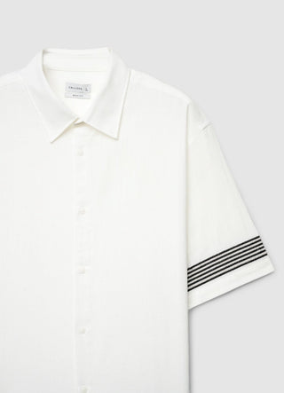 Camicia boxy con righe a contrasto