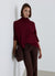 Top with crater neckline and three-quarter sleeves