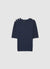 Knitted cable-knit T-shirt with buttons on the shoulders