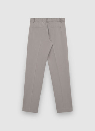 Trousers with pleats and elasticated waist