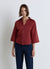 Camicia a tinta unita con scollo a v