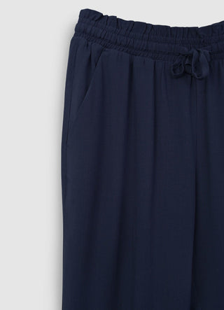 Plain-coloured long trousers