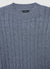 Maglia crop con trecce