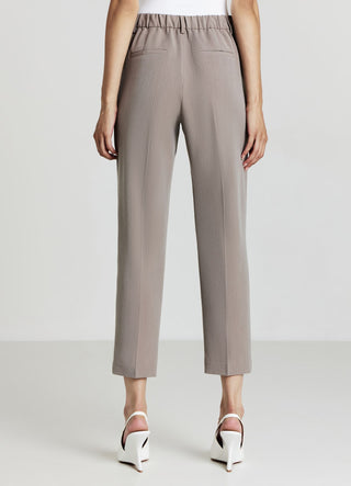 Trousers with pleats and elasticated waist