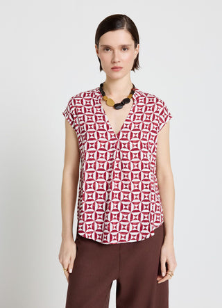 Camicia con stampa geometrica e scollo a V