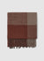 Scarf with fringes and checked pattern