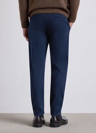 Pantaloni chinos con bottoni in vita