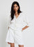 Blusa ajour con scollo a V e laccetti