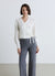 Scaldacuore in maglia traforata con cintura