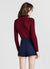 Maglia dolcevita con trecce